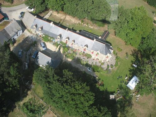 an aerial view of a large house with trees at Le Clos Saint Fiacre in Carentoir