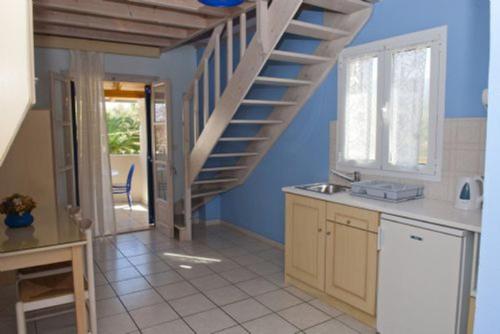 Η κουζίνα ή μικρή κουζίνα στο Angelina Apartments