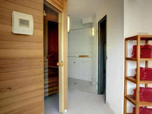 a bathroom with a shower and a toilet in a room at Allgäuhotel Memmingen Nord in Memmingen