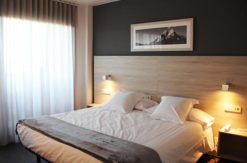 Cama o camas de una habitación en Can Puig
