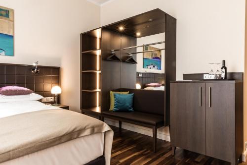 Krevet ili kreveti u jedinici u okviru objekta Hotel Sandwirth