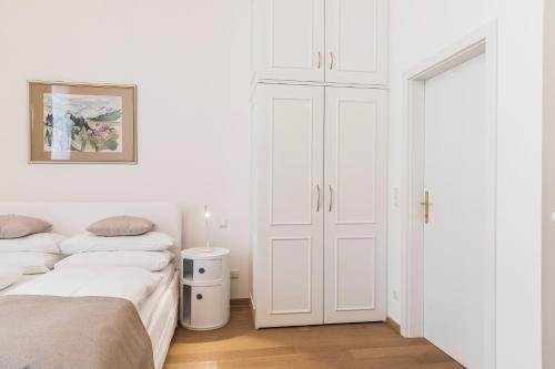 Sandwirth Suites Palais Musilにあるベッド