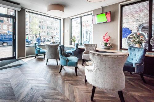Χώρος καθιστικού στο Melrose Hotel