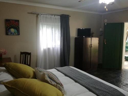 Postel nebo postele na pokoji v ubytování Cadle House