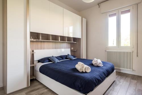 Llit o llits en una habitació de Bologna Accommodation - Fiera - Self checkin - 24h