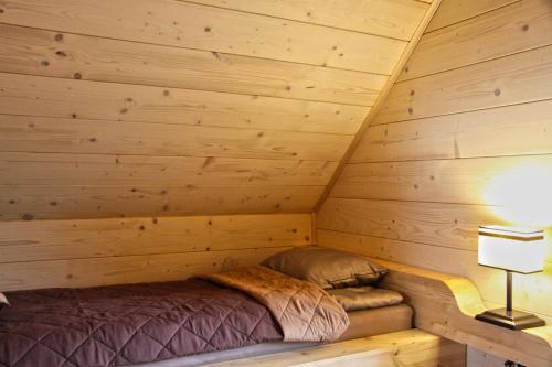 En eller flere senge i et værelse på Bacówki nad jeziorem Goszcza