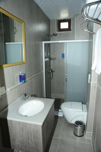 Koupelna v ubytování Casa Grande Otel