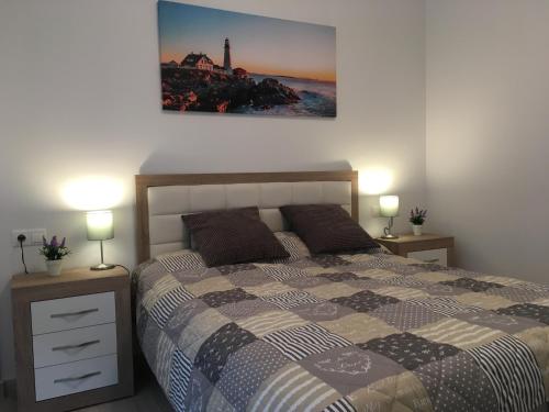 Postel nebo postele na pokoji v ubytování Pinada Beach IV