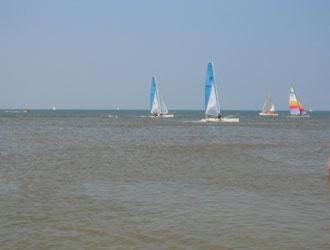a group of sailboats in the water on the ocean at Hotel de Admiraal in Noordwijk aan Zee