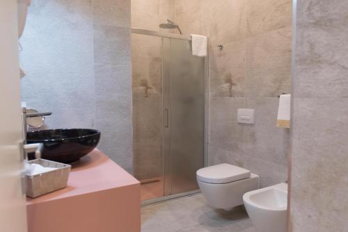 Ett badrum på Palazzo IrMa - Hotel - B&B Luxury