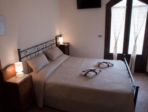 Llit o llits en una habitació de Il Castello