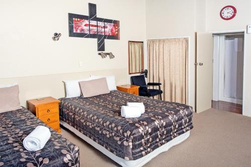 Krevet ili kreveti u jedinici u okviru objekta Tourist Court Motel
