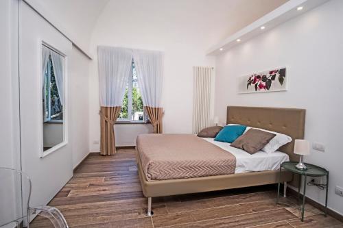 Posteľ alebo postele v izbe v ubytovaní Metahome Sorrento