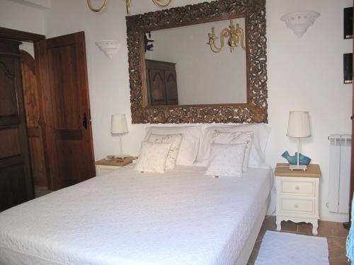 Postel nebo postele na pokoji v ubytování Casa dos Cactos