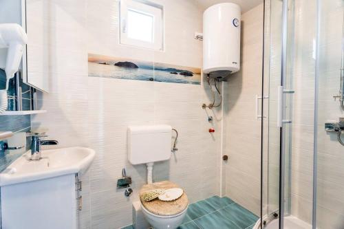 Ένα μπάνιο στο Apartments Belani