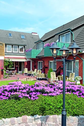 Zahrada ubytování Hotel garni Haus am Meer