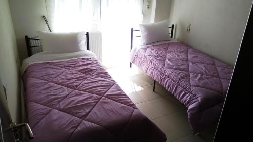 
Ein Bett oder Betten in einem Zimmer der Unterkunft Decosuite Casual Apartments
