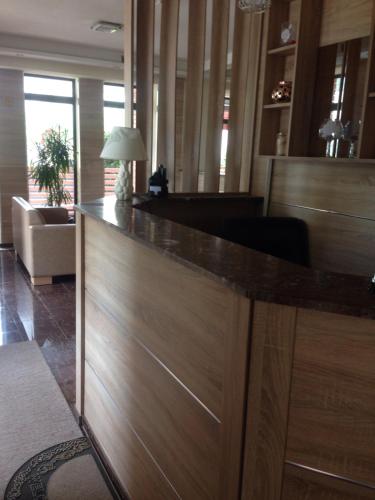a lobby with a reception desk in a building at Hotel Millenium2 in Prizren