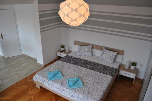 Postel nebo postele na pokoji v ubytování Apartments & Studio Matan