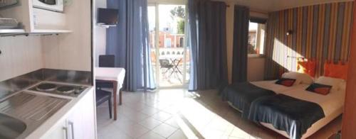 Ένα ή περισσότερα κρεβάτια σε δωμάτιο στο Chambre d'hôtes La Potinière