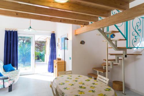 En eller flere senge i et værelse på Appartamento Poggio al Sole