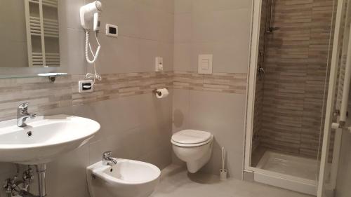 Koupelna v ubytování Hotel Milano