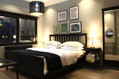 Posteľ alebo postele v izbe v ubytovaní Elite Residency