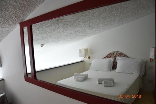 Katil atau katil-katil dalam bilik di Marina Club Hotel