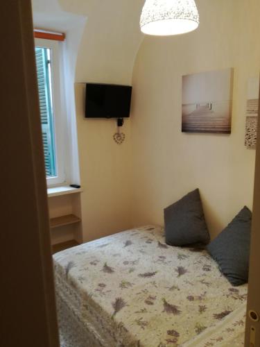 Ένα ή περισσότερα κρεβάτια σε δωμάτιο στο Casa Mirka