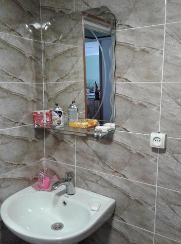 Ein Badezimmer in der Unterkunft Guest Houze Nona