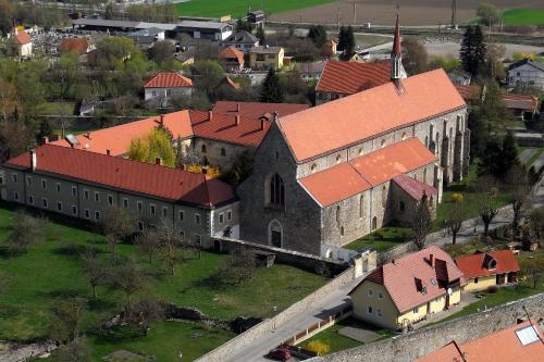 an aerial view of an old church with red roofs at Hütte zum Verlieben in Gurk