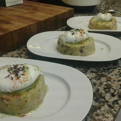 three plates of food on top of a table at Can Vila in Sant Julià del Llor