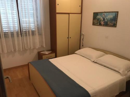 Postel nebo postele na pokoji v ubytování Croatia Mandre