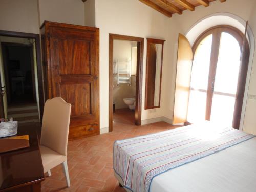 Postel nebo postele na pokoji v ubytování Borgo Sant'Ambrogio - Resort