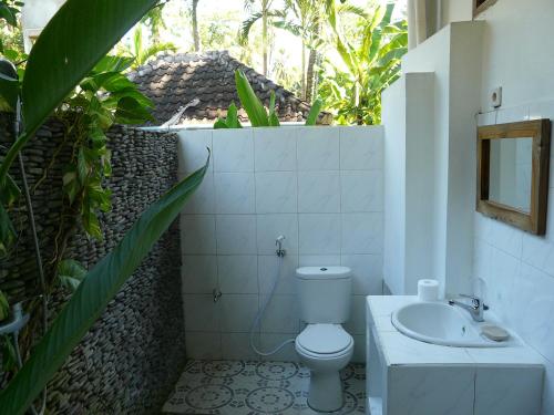 Koupelna v ubytování Bali Sandat