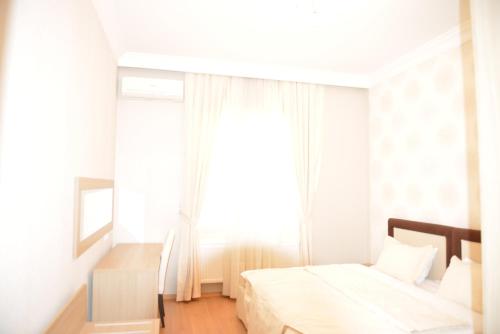Ένα ή περισσότερα κρεβάτια σε δωμάτιο στο Shamakhy Sport Villas