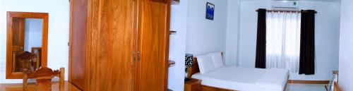 Hotel Đăng Khôi Núi Samにあるベッド