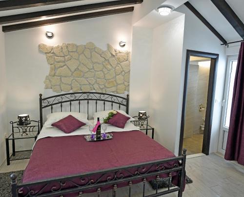 Posteľ alebo postele v izbe v ubytovaní Kuzma Rooms and Apartments