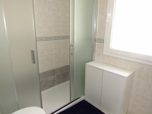 a bathroom with a shower and a toilet at Lomas de Mena in Benalmádena