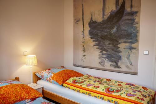 Ein Bett oder Betten in einem Zimmer der Unterkunft Ferienwohnung Berlin
