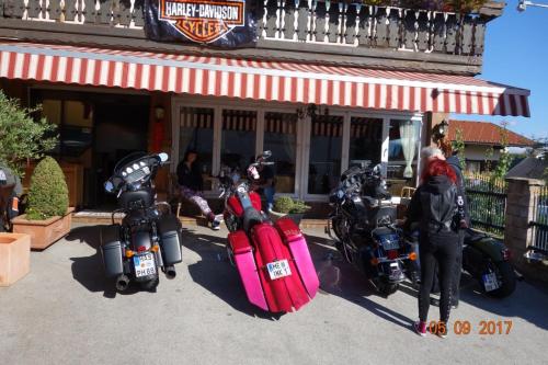 a group of motorcycles parked outside of a restaurant at Gästehaus Trink B&B in Drobollach am Faakersee