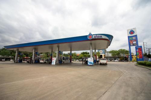 a gas station with a gas station at Jumbo House in Tha Sae
