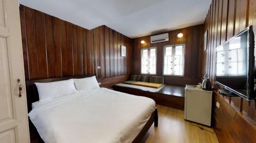 Cama o camas de una habitación en Home & Hashery Boutique House