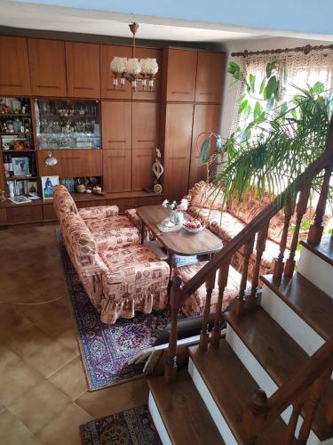 a living room with a couch and a table at Art Studio in Sapareva Banya