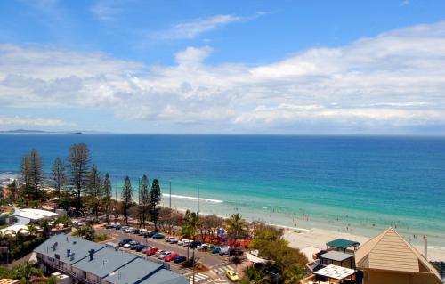 an aerial view of a beach and the ocean at Newport Mooloolaba Apartments in Mooloolaba