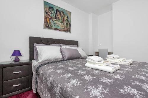 Säng eller sängar i ett rum på Vila Mila Mare