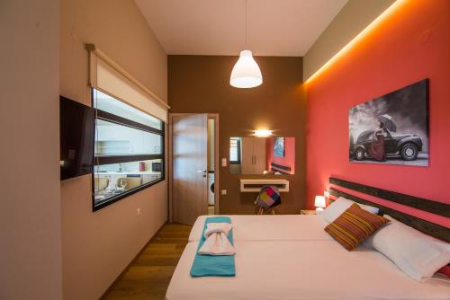 Ένα ή περισσότερα κρεβάτια σε δωμάτιο στο EUPHORIA Luxury Apartment