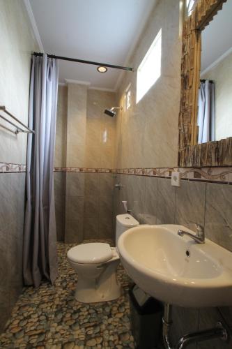 Koupelna v ubytování Jempiring Homestay