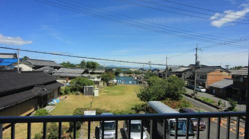 a view of a city from a balcony at Ebisusou in Takashima