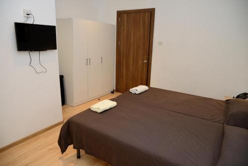 Postel nebo postele na pokoji v ubytování Whitestar Guesthouse